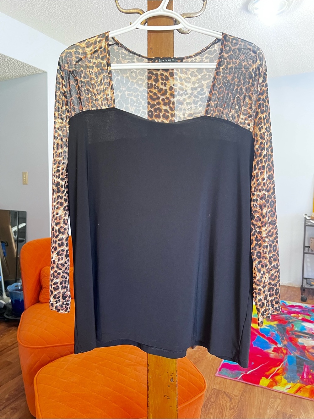 Suzie In The City Black Top with Leopard-Print Sleeves